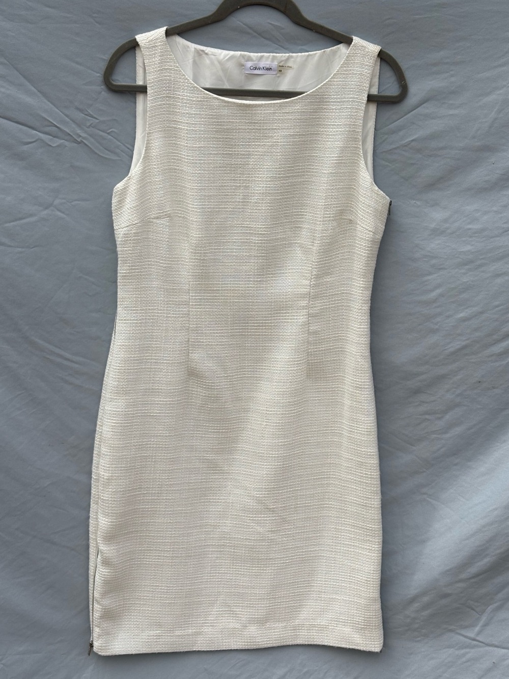 Calvin Klein Sleeveless White and silver textured Sheath Dress.